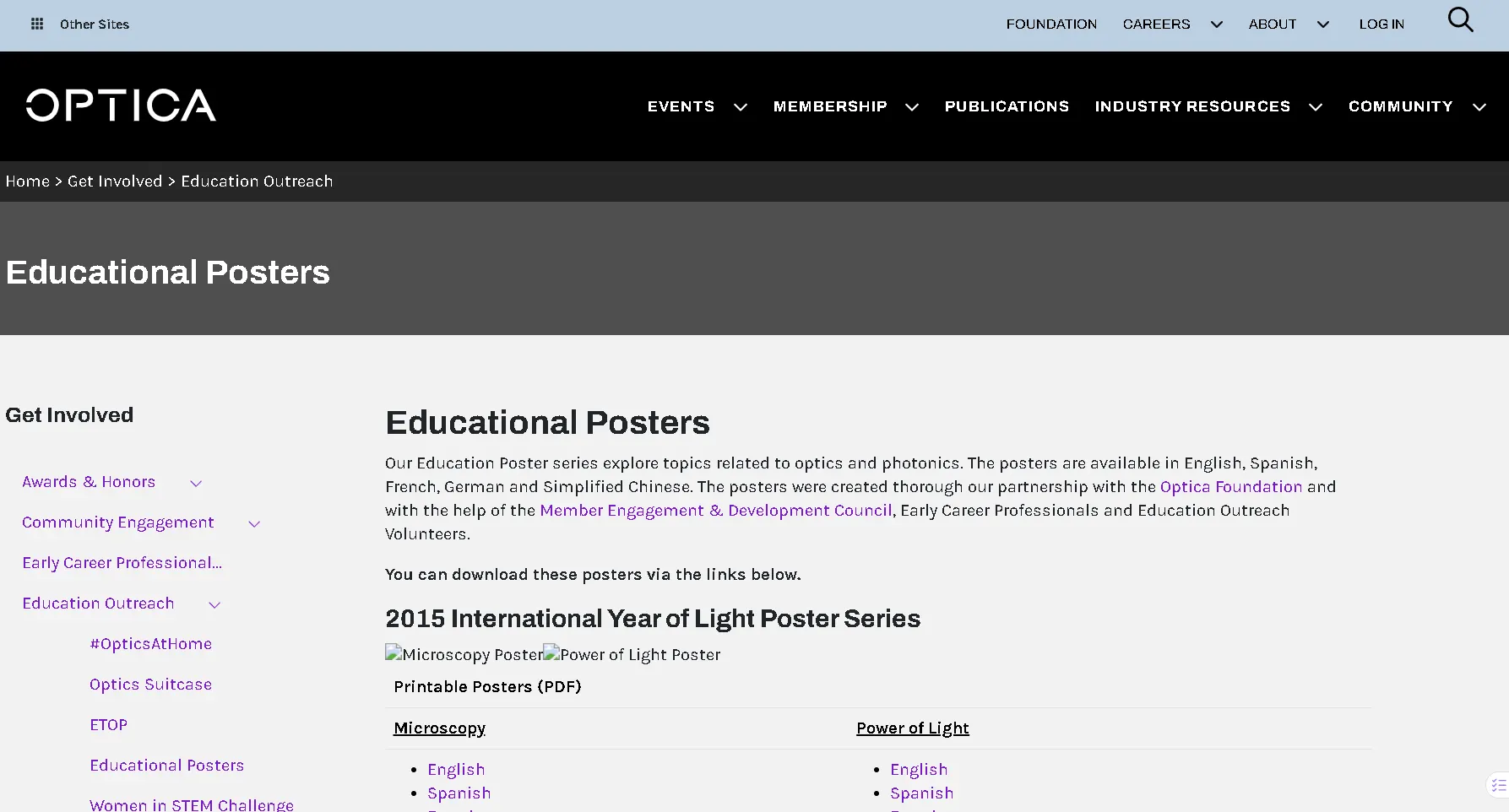 Optica educational posters page featuring downloadable optics and photonics posters on light, imaging, and microscopy topics
