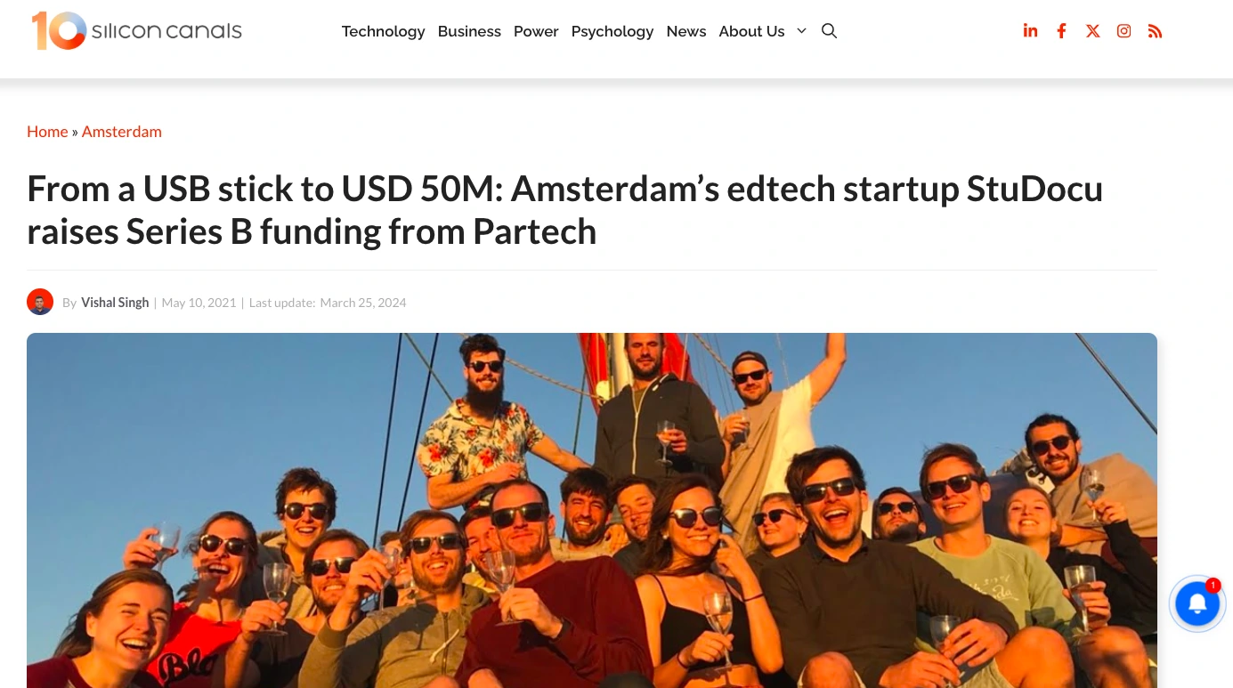 Group of young professionals celebrating on a boat, representing StuDocu team after raising $50 million Series B funding in Amsterdam