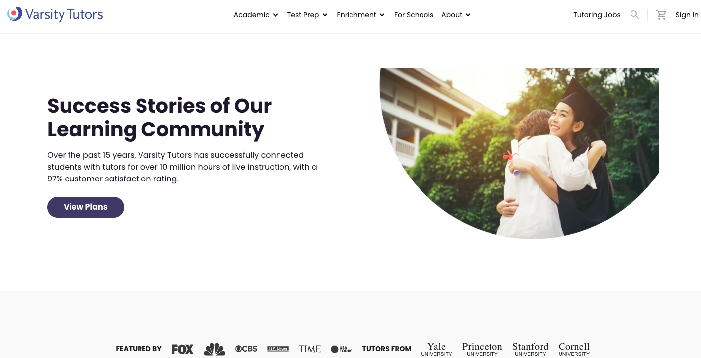 Graduate student in cap and gown hugging a supporter while holding a diploma in a success story banner on the Varsity Tutors website highlighting student achievements.